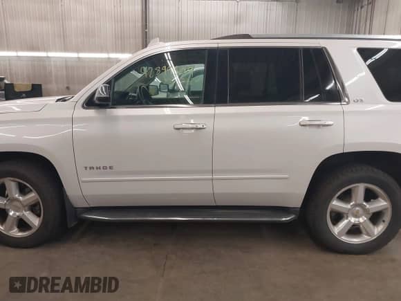 2016 Chevrolet Tahoe LTZ with VIN 1GNSKCKC8GR273955, listed as a IAAI auction lot 42899509 with 163,672 mi miles and . Bid and sale history available at DreamBid. Image 15.