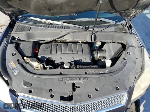 2011 Chevrolet Traverse 1LT with VIN 1GNKRGED6BJ283785, listed as a Copart auction lot 87205265 with 142,842 mi miles and Salvage title. Bid and sale history available at DreamBid. Image 12.