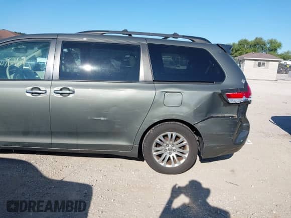 2011 Toyota Sienna XLE AAS with VIN 5TDYK3DC2BS162683, listed as a IAAI auction lot 43076269 with 181,260 mi miles and . Bid and sale history available at DreamBid. Image 6.