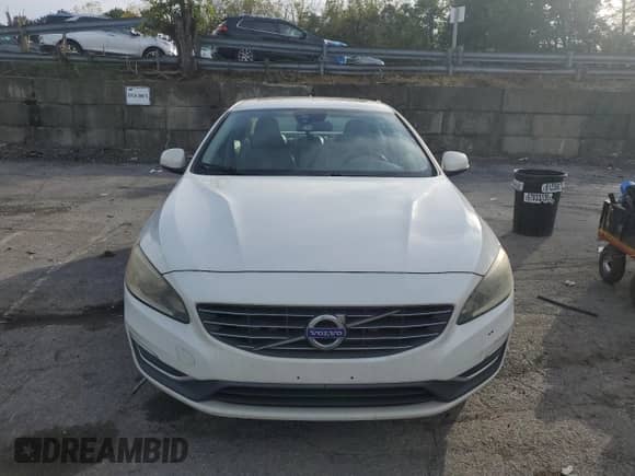2014 Volvo S60 T5 z VIN YV1612FHXE1290131, wystawiony jako Copart lot #84538645 z przebiegiem 129 944 mil mil oraz Szkoda całkowita • Salvage title. Historia ofert i sprzedaży dostępna na DreamBid. Obrazek 5.