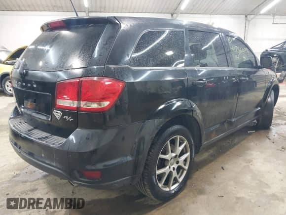 2014 Dodge Journey R/T with VIN 3C4PDDEGXET309453, listed as a IAAI auction lot 42756073 with 158,481 mi miles and . Bid and sale history available at DreamBid. Image 4.