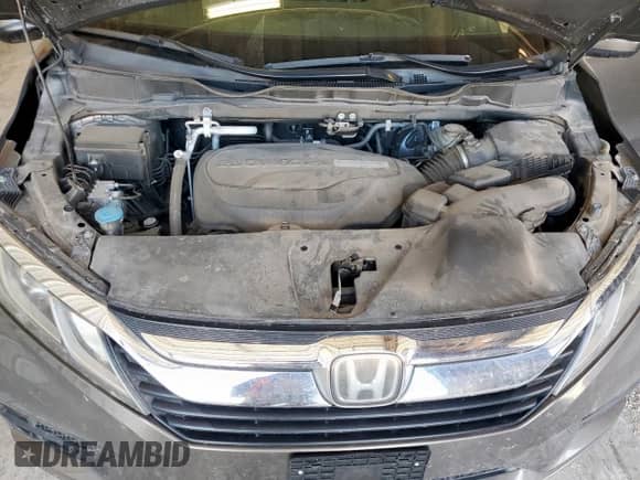 2020 Honda Odyssey EX-L with VIN 5FNRL6H73LB058001, listed as a Copart auction lot 83824655 with 86,894 mi miles and Salvage title. Bid and sale history available at DreamBid. Image 12.