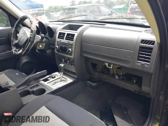 2010 Dodge Nitro SE with VIN 1D4PU2GK0AW142999, listed as a IAAI auction lot 42549000 with 87,577 mi miles and . Bid and sale history available at DreamBid. Image 5.