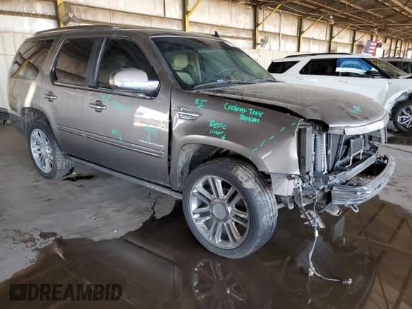 2012 Cadillac Escalade Premium с VIN 1GYS4CEF9CR225037, выставлен на аукционе Copart как лот 50270415 с пробегом 172 483 миль миль и Списание • Salvage title. История ставок и продаж доступна на DreamBid. Изображение 4.