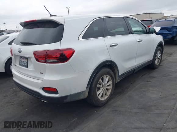 2019 Kia Sorento L with VIN 5XYPG4A3XKG536087, listed as a IAAI auction lot 42180549 with 103,758 mi miles and . Bid and sale history available at DreamBid. Image 4.