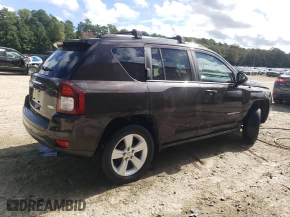 2014 Jeep Compass Latitude with VIN 1C4NJCEA4ED643134, listed as a Copart auction lot 71044335 with 103,025 mi miles and Salvage title. Bid and sale history available at DreamBid. Image 3.