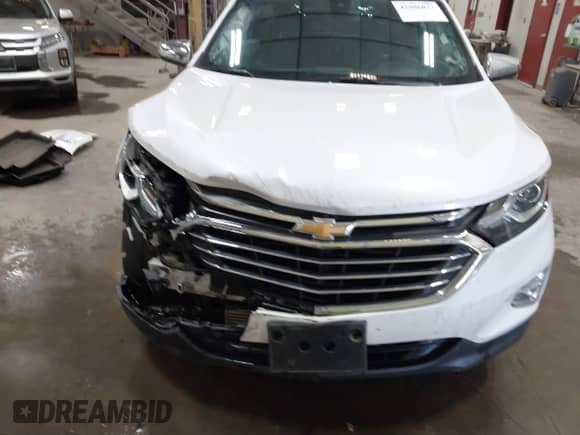 2018 Chevrolet Equinox Premier с VIN 2GNAXWEXXJ6296217, выставлен на аукционе IAAI как лот 42986027 с пробегом 54 709 миль миль и . История ставок и продаж доступна на DreamBid. Изображение 21.