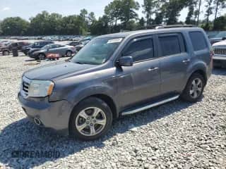 2014 Honda Pilot EX-L with VIN 5FNYF4H56EB016737, listed as a Copart auction lot 80152565 with 174,259 mi miles and Salvage title. Bid and sale history available at DreamBid. Image 1.