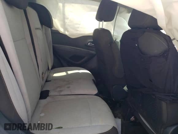 2021 Chevrolet Trax LS с VIN KL7CJKSBXMB306411, выставлен на аукционе Copart как лот 68082365 с пробегом 129 613 миль миль и Списание • Salvage title. История ставок и продаж доступна на DreamBid. Изображение 11.