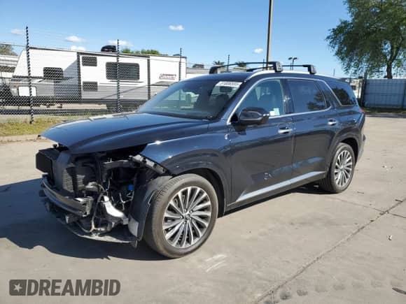 2023 Hyundai Palisade Calligraphy с VIN KM8R74GE5PU601026, выставлен на аукционе Copart как лот 51806555 с пробегом 11 622 миль миль и Списание • Salvage title. История ставок и продаж доступна на DreamBid. Изображение 1.