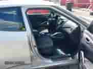 2012 Hyundai Veloster w/Red Int z VIN KMHTC6AD2CU061478, wystawiony jako IAAI lot #43104434 z przebiegiem 216 113 mil mil oraz . Historia ofert i sprzedaży dostępna na DreamBid. Obrazek 5.