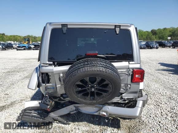 2021 Jeep Wrangler Unlimited Sahara with VIN 1C4JJXP67MW686559, listed as a Copart auction lot 52409305 with 43,902 mi miles and Salvage title. Bid and sale history available at DreamBid. Image 6.