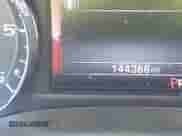 2014 GMC Sierra 1500 SLT z VIN 3GTP1VECXEG466470, wystawiony jako IAAI lot #43427300 z przebiegiem 144 368 mil mil oraz . Historia ofert i sprzedaży dostępna na DreamBid. Obrazek 15.