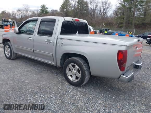 2010 Chevrolet Colorado 1LT z VIN 1GCDSCDE6A8133142, wystawiony jako IAAI lot #41843196 z przebiegiem 157 315 mil mil oraz . Historia ofert i sprzedaży dostępna na DreamBid. Obrazek 3.