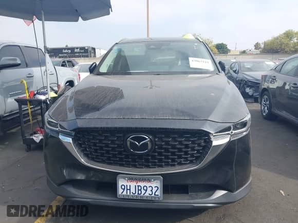 2023 Mazda CX-5 S Select with VIN JM3KFBBM5P0267090, listed as a IAAI auction lot 43063119 with 27,272 mi miles and . Bid and sale history available at DreamBid. Image 12.