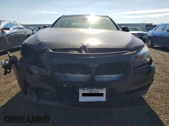 2013 BMW 7 Series 750Li xDrive с VIN WBAYF8C53DDE59075, выставлен на аукционе Copart как лот 69854475 с пробегом Не указан миль и Списание • Salvage title. История ставок и продаж доступна на DreamBid. Изображение 5.