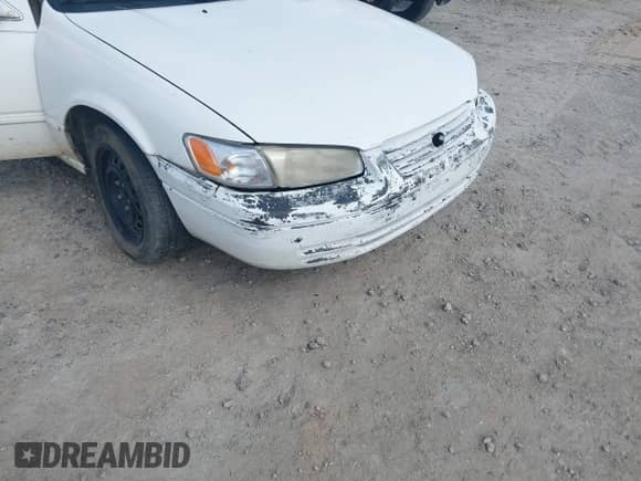 1998 Toyota Camry LE z VIN 4T1BG22K5WU381145, wystawiony jako IAAI lot #42436786 z przebiegiem 294 365 mil mil oraz . Historia ofert i sprzedaży dostępna na DreamBid. Obrazek 6.