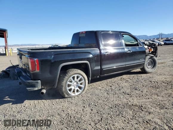2016 GMC Sierra 1500 Denali z VIN 3GTU2PEJ5GG133865, wystawiony jako Copart lot #78105274 z przebiegiem 128 467 mil mil oraz Szkoda całkowita • Salvage title. Historia ofert i sprzedaży dostępna na DreamBid. Obrazek 3.