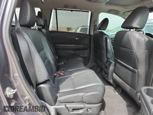 2017 Honda Pilot Touring с VIN 5FNYF6H90HB049168, выставлен на аукционе Copart как лот 69983165 с пробегом 124 467 миль миль и Списание • Salvage title. История ставок и продаж доступна на DreamBid. Изображение 10.