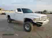 2001 Dodge 2500 with VIN 3B7KF26661M584823, listed as a Copart auction lot 80138064 with 260,277 mi miles and Clean title. Bid and sale history available at DreamBid. Image 4.