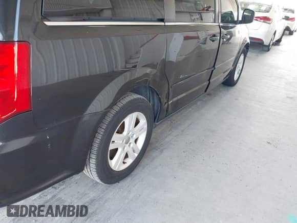 2013 Dodge Grand Caravan Crew with VIN 2C4RDGDG8DR693522, listed as a IAAI auction lot 43275399 with 144,142 mi miles and . Bid and sale history available at DreamBid. Image 6.