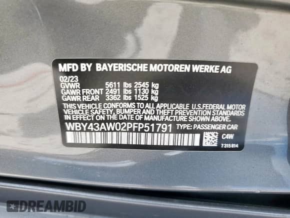 2023 BMW i4 eDrive35 with VIN WBY43AW02PFP51791, listed as a Copart auction lot 66698385 with 8,749 mi miles and Salvage title. Bid and sale history available at DreamBid. Image 12.