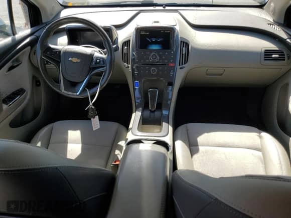 2014 Chevrolet Volt с VIN 1G1RF6E49EU165719, выставлен на аукционе Copart как лот 82210205 с пробегом 74 909 миль миль и Списание • Salvage title. История ставок и продаж доступна на DreamBid. Изображение 8.
