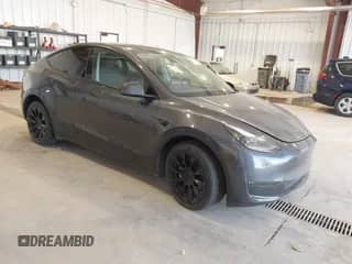 2023 Tesla Model Y Long Range z VIN 7SAYGDEE5PA203388, wystawiony jako IAAI lot #42612438 z przebiegiem 38 548 mil mil oraz . Historia ofert i sprzedaży dostępna na DreamBid. Obrazek 1.
