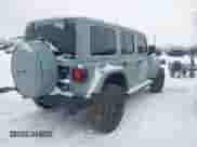 2023 Jeep Wrangler Rubicon 392 with VIN 1C4JJXSJ7PW688280, listed as a IAAI auction lot 41242708 with 8,309 mi miles and . Bid and sale history available at DreamBid. Image 4.