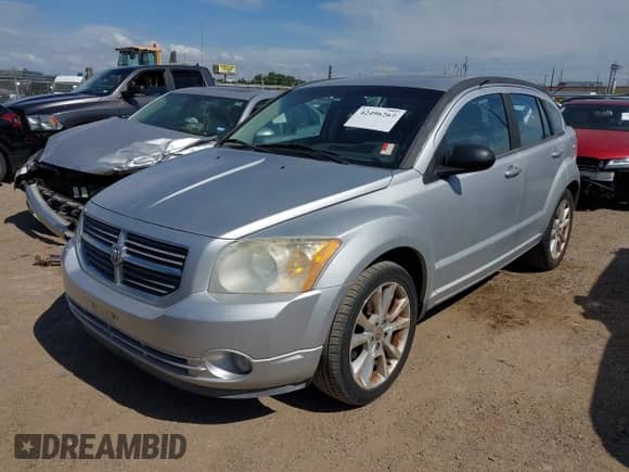 2011 Dodge Caliber Heat with VIN 1B3CB5HA6BD254536, listed as a IAAI auction lot 42496269 with 183,047 mi miles and . Bid and sale history available at DreamBid. Image 6.