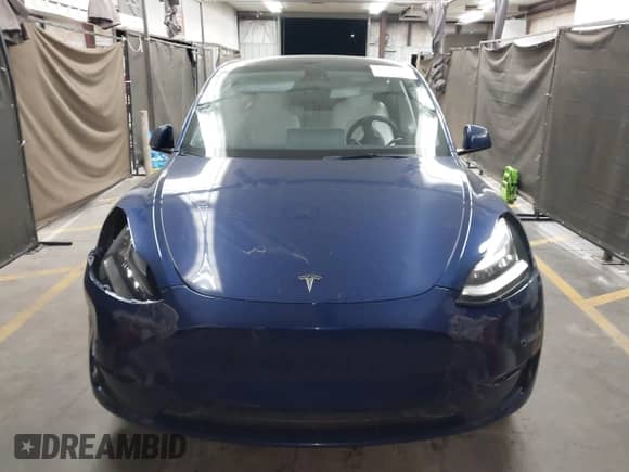 2023 Tesla Model Y Long Range с VIN 7SAYGDEE1PF592002, выставлен на аукционе IAAI как лот 43035517 с пробегом Не указан миль и . История ставок и продаж доступна на DreamBid. Изображение 11.