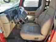 2000 Jeep Wrangler SE with VIN 1J4FA29P4YP798115, listed as a Copart auction lot 80751605 with 119,345 mi miles and Salvage title. Bid and sale history available at DreamBid. Image 7.