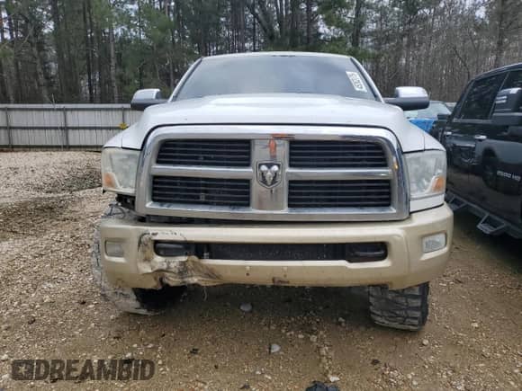2012 Dodge RAM с VIN 3C6UD5LL4CG338615, выставлен на аукционе Copart как лот 45263175 с пробегом 232 166 миль миль и Списание • Salvage title. История ставок и продаж доступна на DreamBid. Изображение 5.