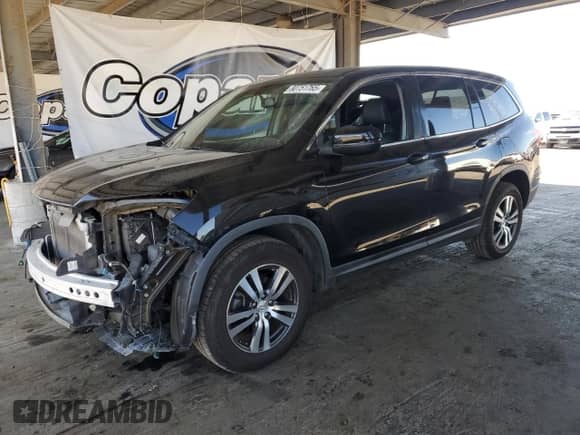 2017 Honda Pilot EX-L with VIN 5FNYF5H52HB017345, listed as a Copart auction lot 80751765 with 129,760 mi miles and Salvage title. Bid and sale history available at DreamBid. Image 1.