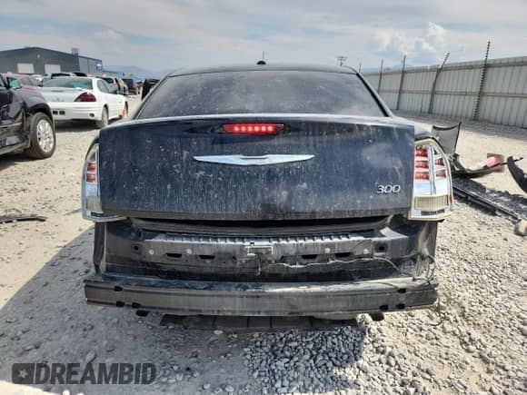 2012 Chrysler 300 z VIN 2C3CCAAG4CH138506, wystawiony jako Copart lot #71362215 z przebiegiem Nie podano mil oraz Szkoda całkowita • Salvage title. Historia ofert i sprzedaży dostępna na DreamBid. Obrazek 6.