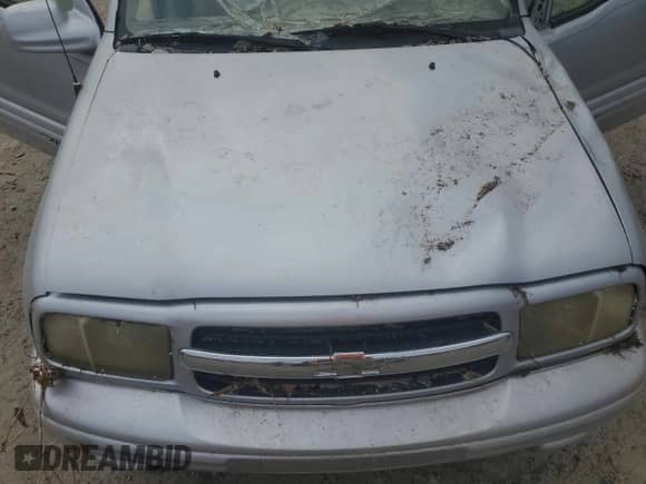 2004 Chevrolet Tracker LT with VIN 2CNBE634746907607, listed as a Copart auction lot 77958934 with Not provided miles and Clean title. Bid and sale history available at DreamBid. Image 12.