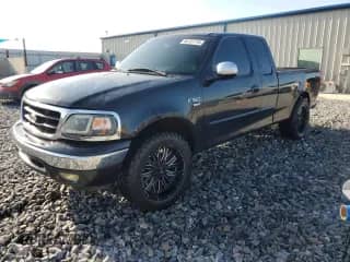 2001 Ford F-150 XL с VIN 1FTRX17W51NA00485, выставлен на аукционе Copart как лот 66151715 с пробегом Не указан миль и Списание • Salvage title. История ставок и продаж доступна на DreamBid. Изображение 1.