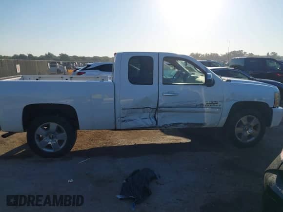 2009 Chevrolet Silverado 1500 LT z VIN 1GCEC29J49Z272449, wystawiony jako IAAI lot #43393721 z przebiegiem 162 795 mil mil oraz . Historia ofert i sprzedaży dostępna na DreamBid. Obrazek 13.