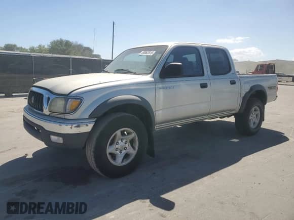 2002 Toyota Tacoma PreRunner z VIN 5TEGM92N82Z052575, wystawiony jako Copart lot #50062815 z przebiegiem 314 154 mil mil oraz Czysty tytuł • Clean title. Historia ofert i sprzedaży dostępna na DreamBid. Obrazek 1.
