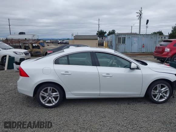 2015 Volvo S60 T5 Drive-E Premier with VIN YV140MFK2F2339819, listed as a IAAI auction lot 42651504 with 127,550 mi miles and . Bid and sale history available at DreamBid. Image 14.