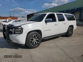 2007 Chevrolet Suburban LT z VIN 1GNFC16J97J149753, wystawiony jako Copart lot #80802075 z przebiegiem 243 593 mil mil oraz Szkoda całkowita • Salvage title. Historia ofert i sprzedaży dostępna na DreamBid. Obrazek 1.