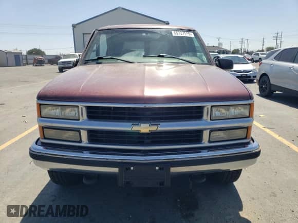 1997 Chevrolet Tahoe with VIN 1GNEK13R3VJ435765, listed as a Copart auction lot 65727515 with 140,548 mi miles and Salvage title. Bid and sale history available at DreamBid. Image 5.