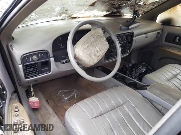 1994 Chevrolet Caprice LS с VIN 1G1BN52P6RR169040, выставлен на аукционе Copart как лот 47923485 с пробегом Не указан миль и Списание • Salvage title. История ставок и продаж доступна на DreamBid. Изображение 8.