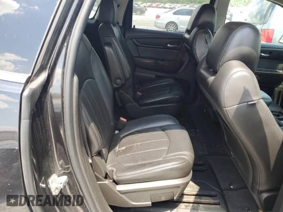 2013 Chevrolet Traverse LTZ z VIN 1GNKRLKD2DJ117778, wystawiony jako Copart lot #61408935 z przebiegiem 160 438 mil mil oraz Szkoda całkowita • Salvage title. Historia ofert i sprzedaży dostępna na DreamBid. Obrazek 11.