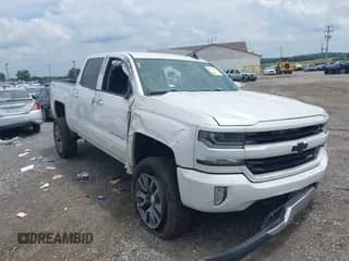 2016 Chevrolet Silverado 1500 LT with VIN 3GCUKREC4GG363667, listed as a IAAI auction lot 42617337 with 149,385 mi miles and . Bid and sale history available at DreamBid. Image 1.