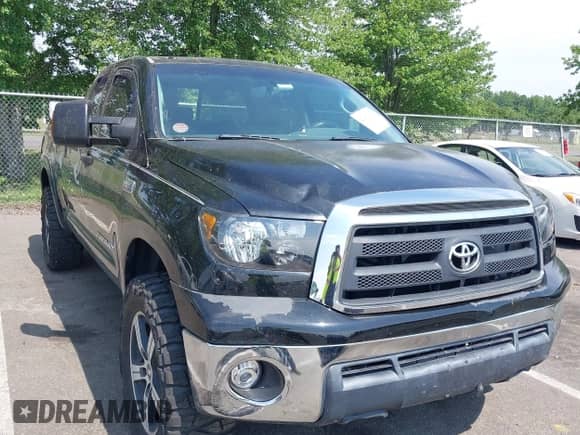2012 Toyota Tundra z VIN 5TFRY5F10CX117652, wystawiony jako IAAI lot #42617080 z przebiegiem 233 560 mil mil oraz . Historia ofert i sprzedaży dostępna na DreamBid. Obrazek 1.