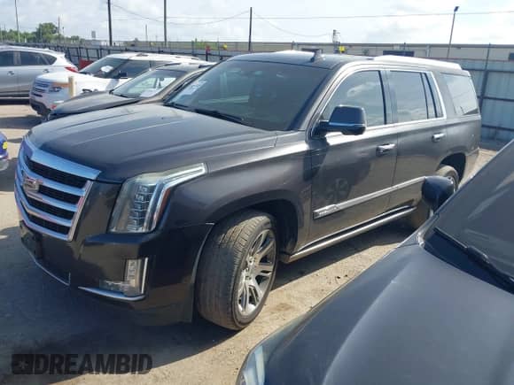 2015 Cadillac Escalade Premium with VIN 1GYS3NKJ2FR538734, listed as a IAAI auction lot 43114025 with 222,722 mi miles and . Bid and sale history available at DreamBid. Image 2.