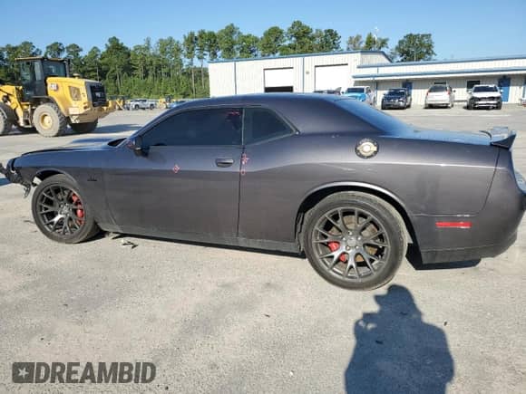 2015 Dodge Challenger SRT 392 with VIN 2C3CDZDJ4FH809650, listed as a Copart auction lot 71700425 with 111,922 mi miles and Salvage title. Bid and sale history available at DreamBid. Image 2.
