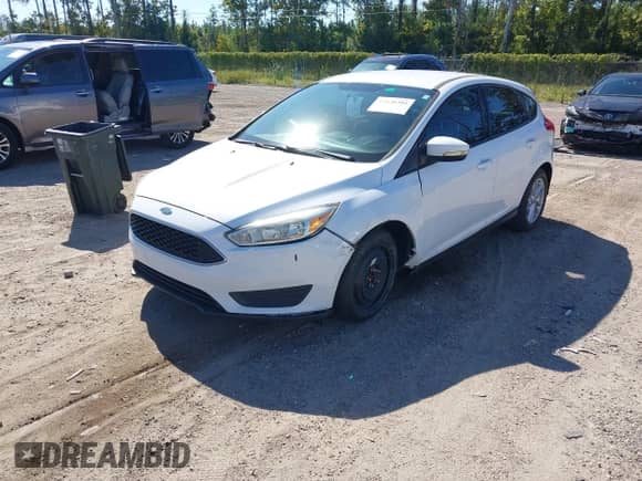 2015 Ford Focus SE z VIN 1FADP3K24FL304572, wystawiony jako IAAI lot #43530381 z przebiegiem 80 729 mil mil oraz . Historia ofert i sprzedaży dostępna na DreamBid. Obrazek 2.