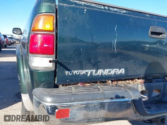 2001 Toyota Tundra Limited z VIN 5TBRT38171S140583, wystawiony jako IAAI lot #41291679 z przebiegiem 228 139 mil mil oraz . Historia ofert i sprzedaży dostępna na DreamBid. Obrazek 13.